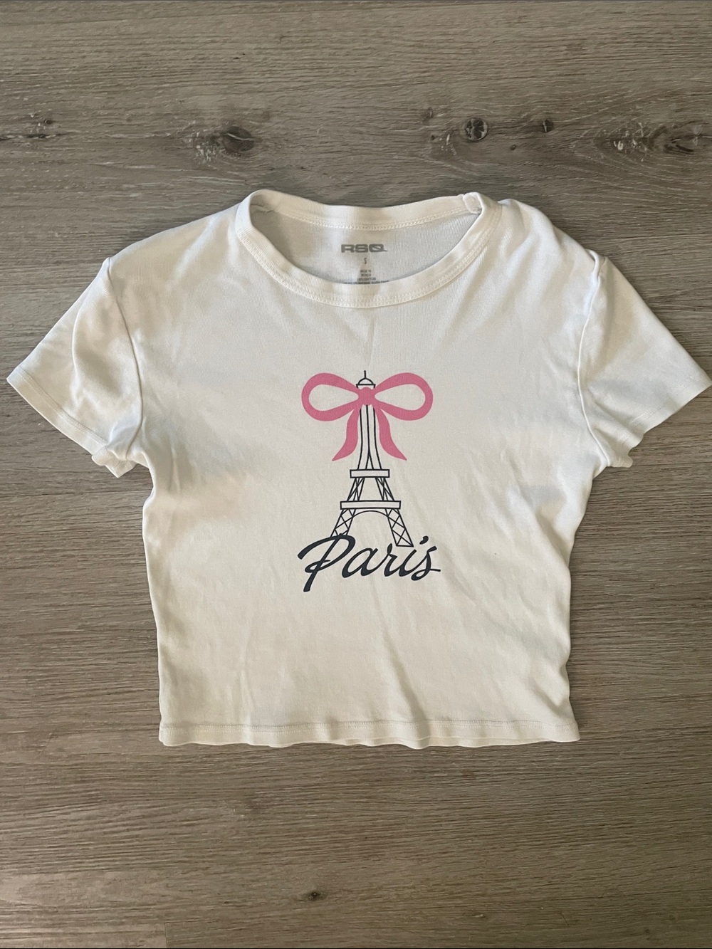 RSQ White Women’s Cropped Paris Graphic Tee with Pink Bow